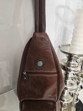 Mouflon Men's Brown Leather Sling Belt Bag with Front Zip and Logo Medallion